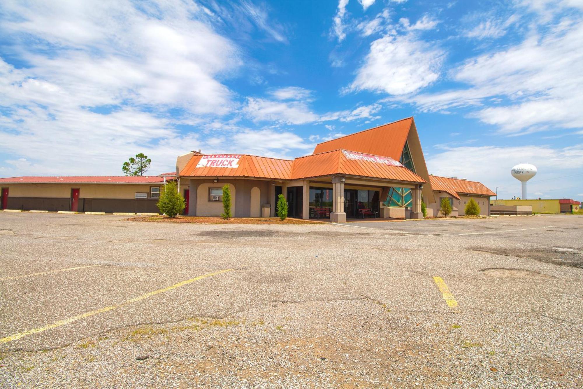 American Best Inn By Oyo I-35 Perry Near Lake Mcmurtry Exteriör bild